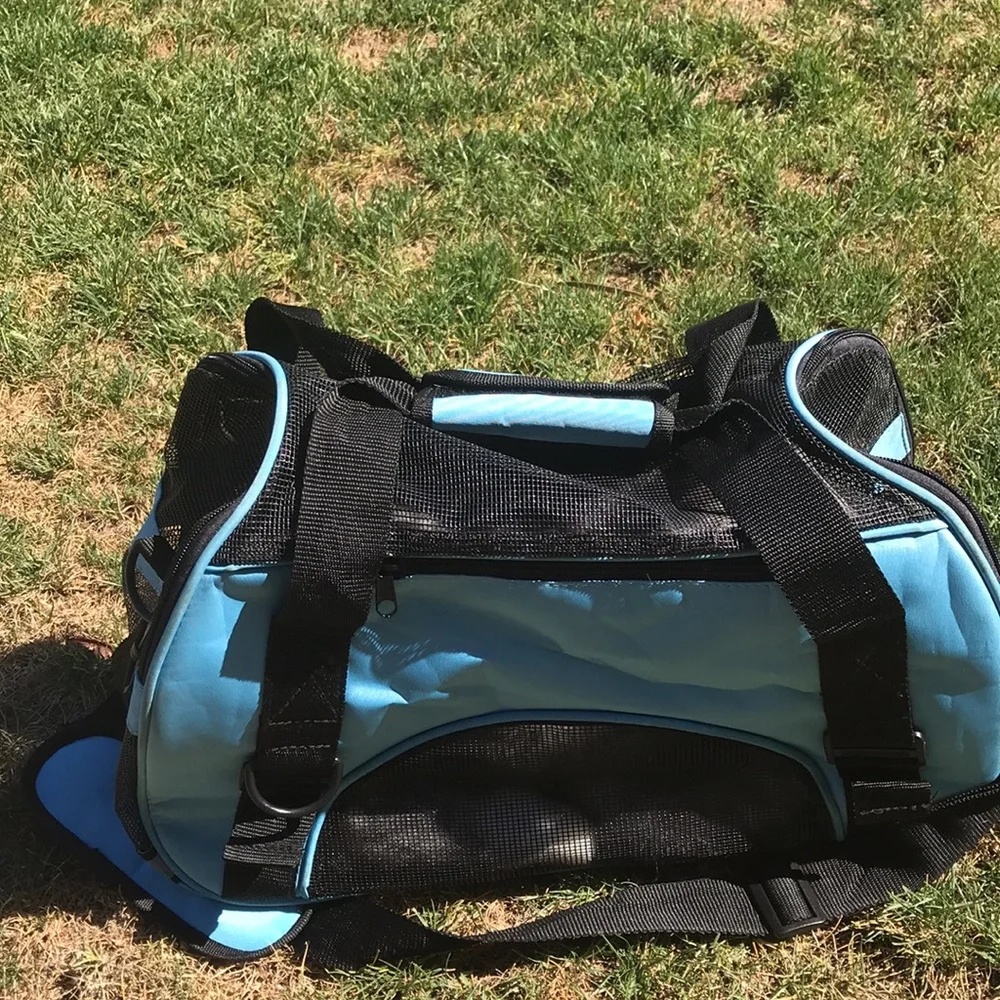 - Pet Carrier with shoulder strap light blue and black well vented used 1x
